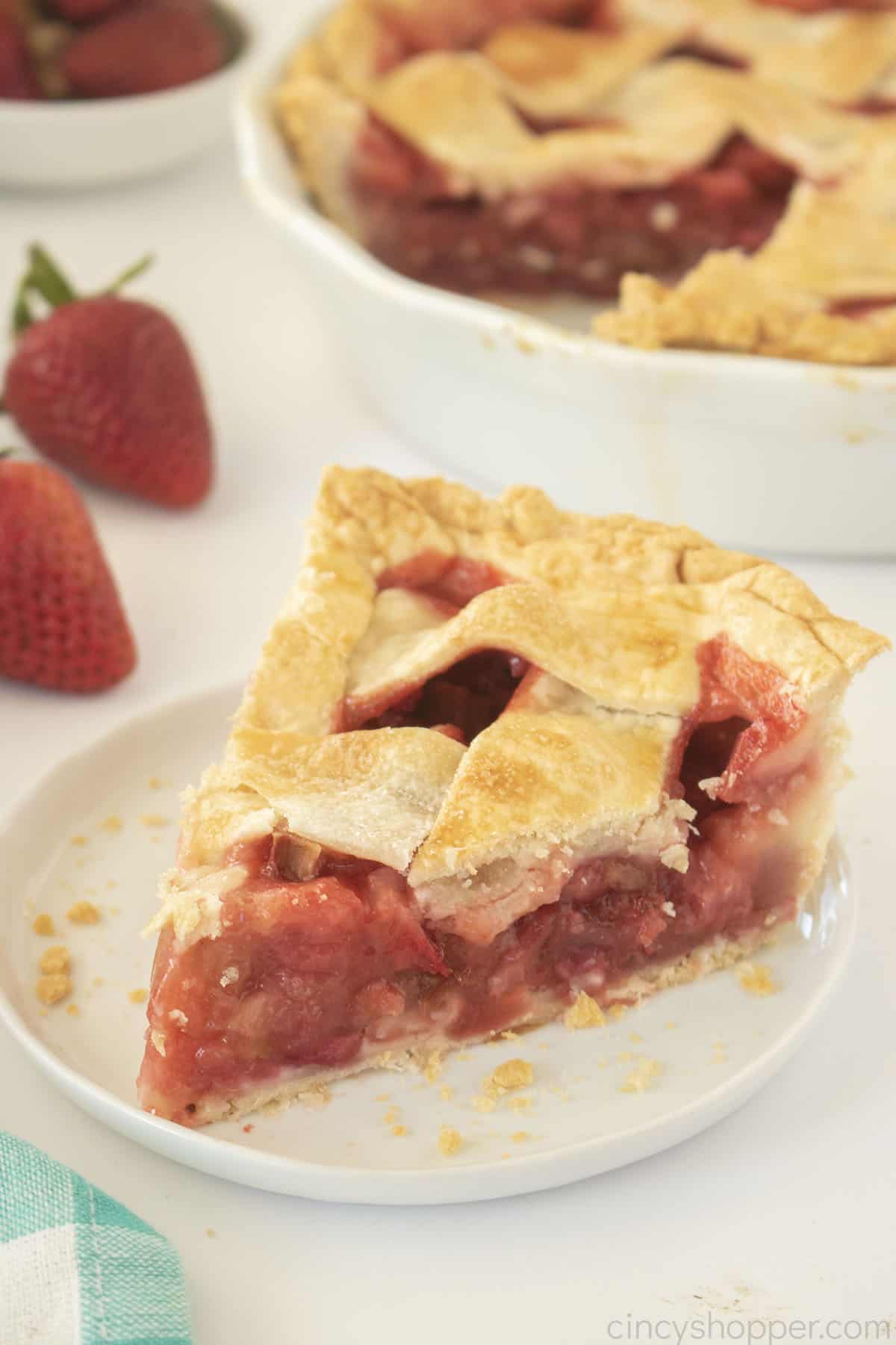 Slice of Old Fashioned strawberry Pie on a plate.