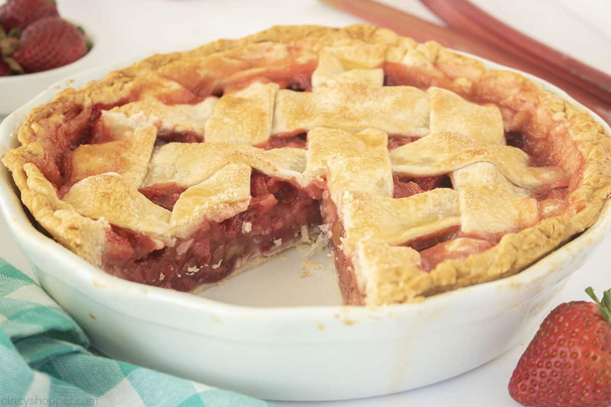 White pie pan with strawberry and rhubarb Pie