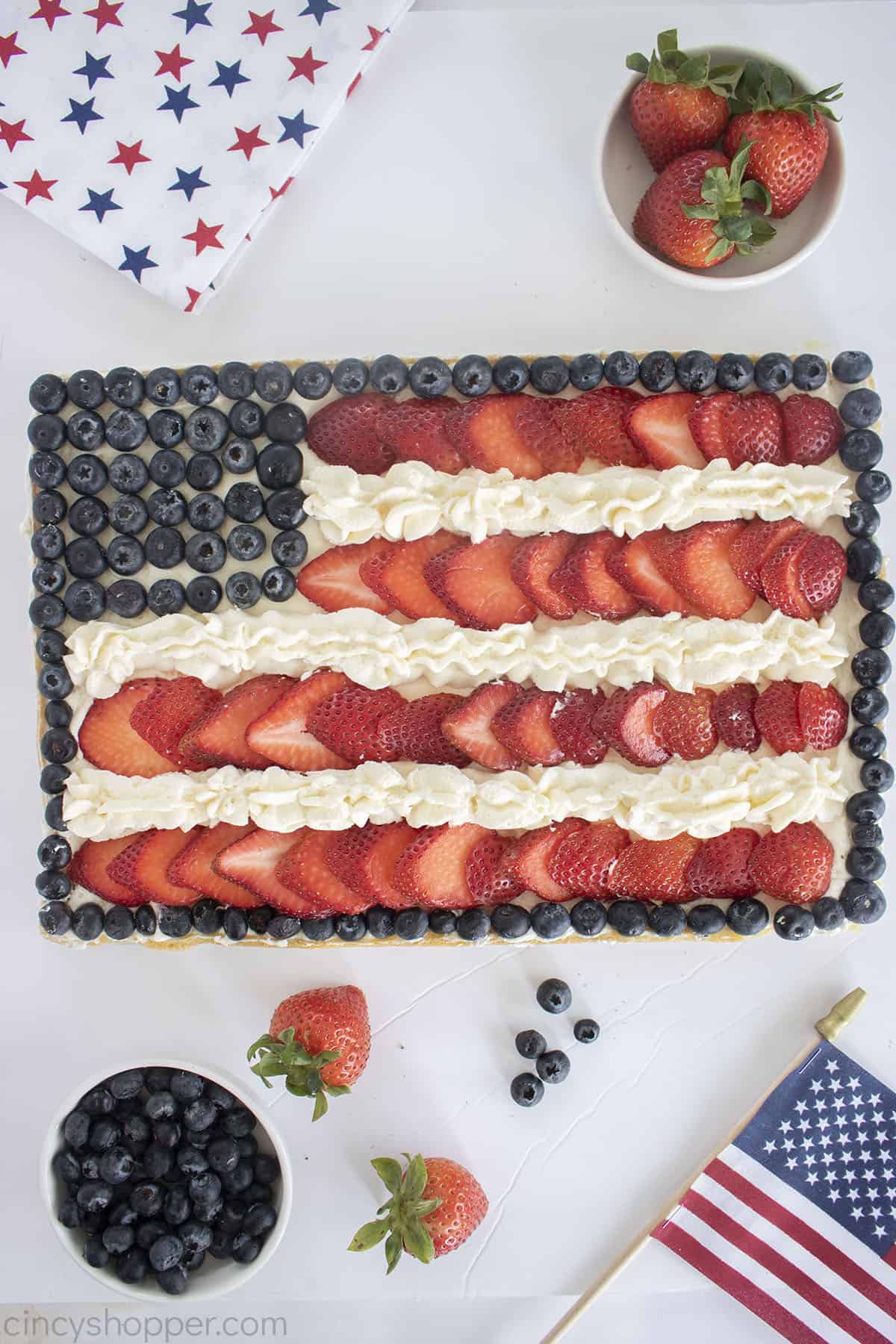 4th of July Flag Fruit Pizza with strawberries and blueberries.