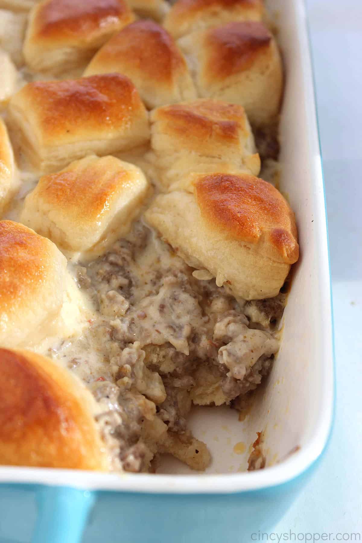 Biscuits and gravy casserole in a baking dish.