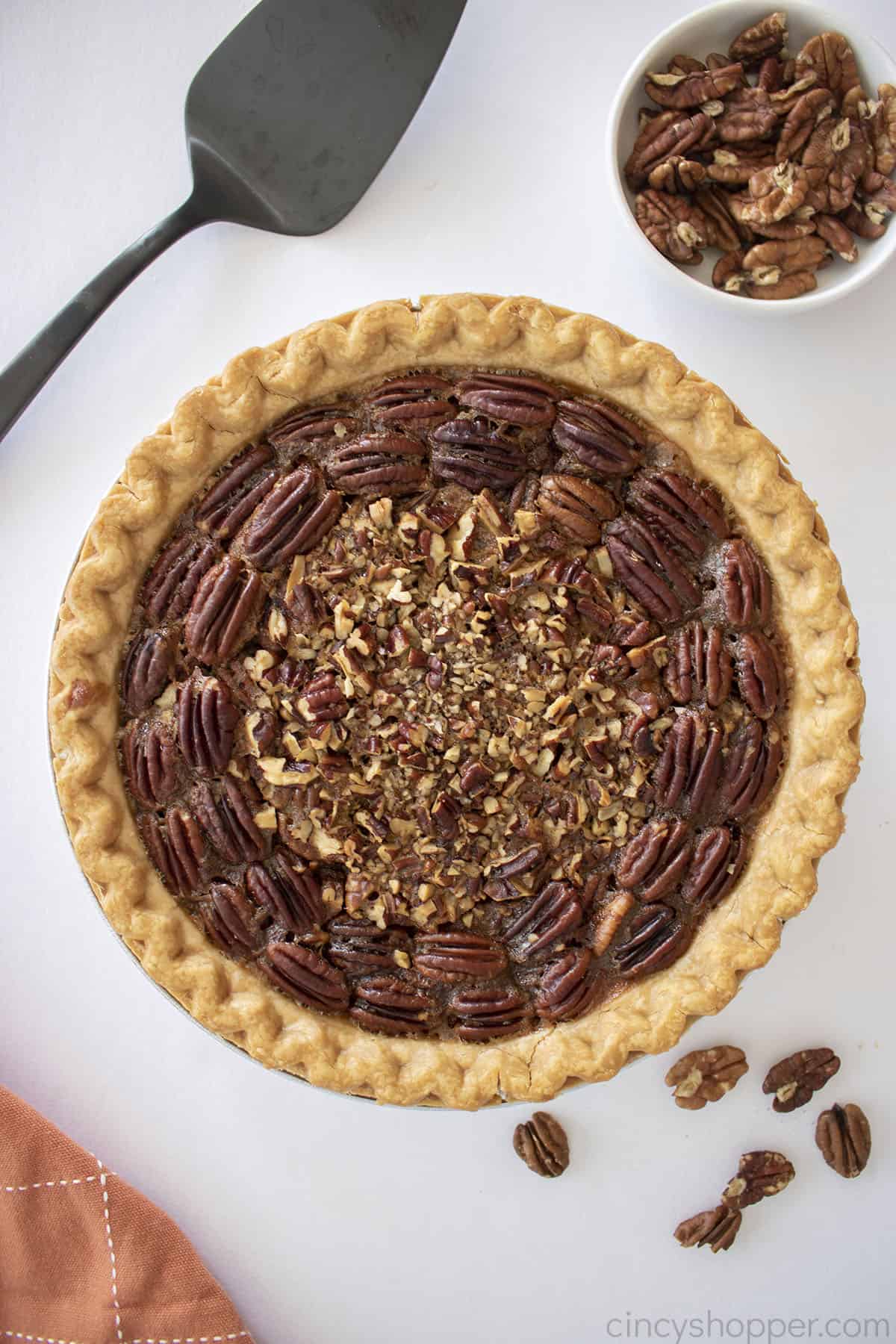 Whole Old Fashioned Pecan Pie with topping.