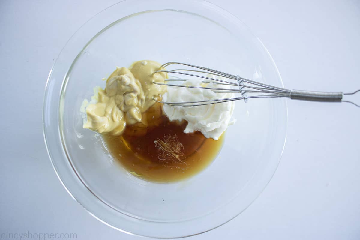 Mixing Honey Mustard sauce in a bowl.