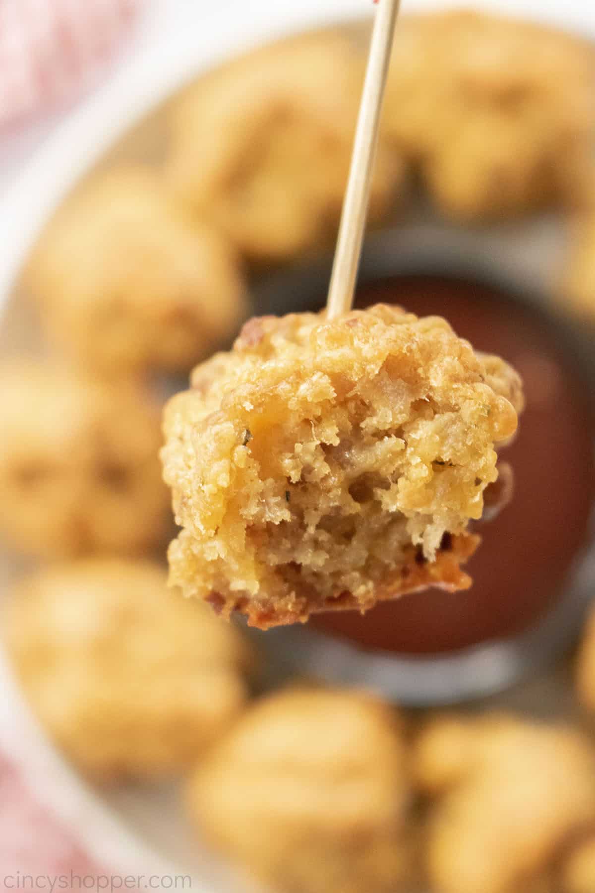 Bisquick sausage ball on a appetizer stick.
