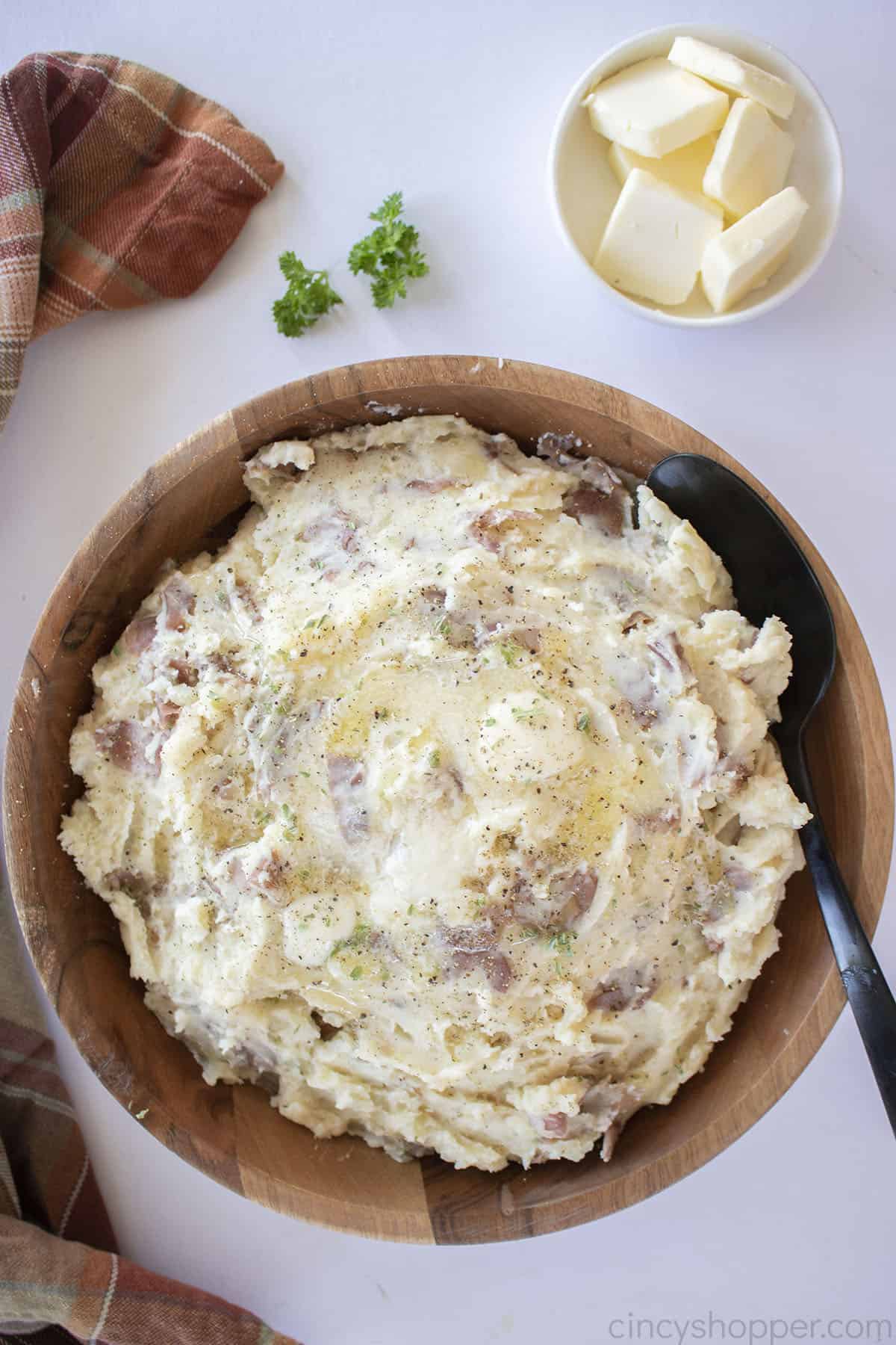 Red Skin MAshed Potatoes in a brown bowl.