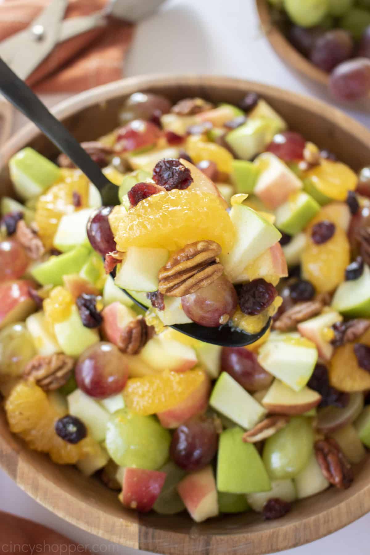 Spoon with Fall Fruit Salad.
