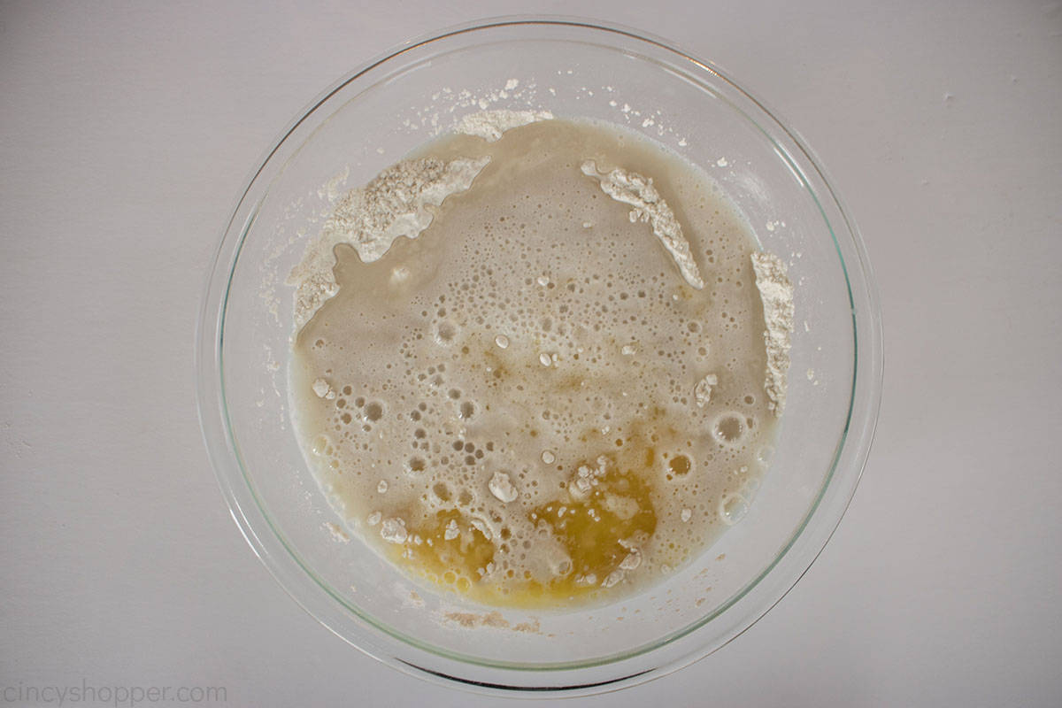 Yeast added to dry ingredient bowl.