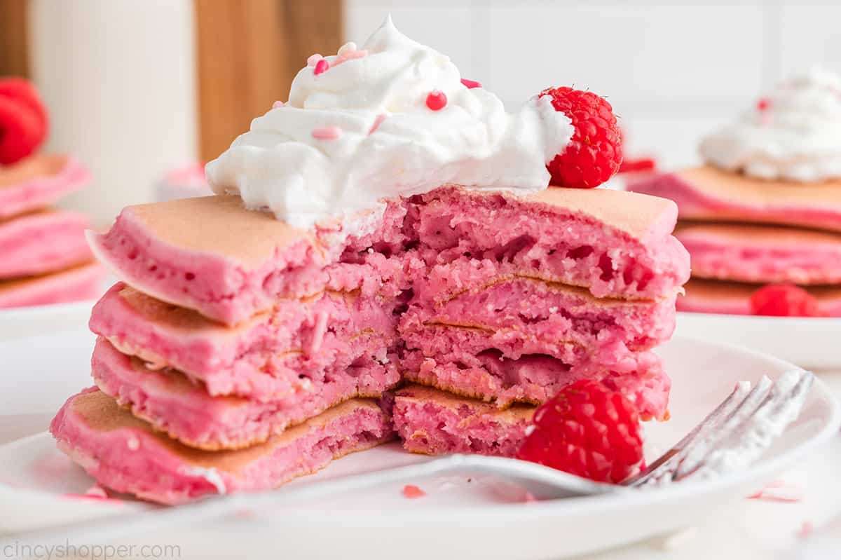 Inside of pink pancakes stack.