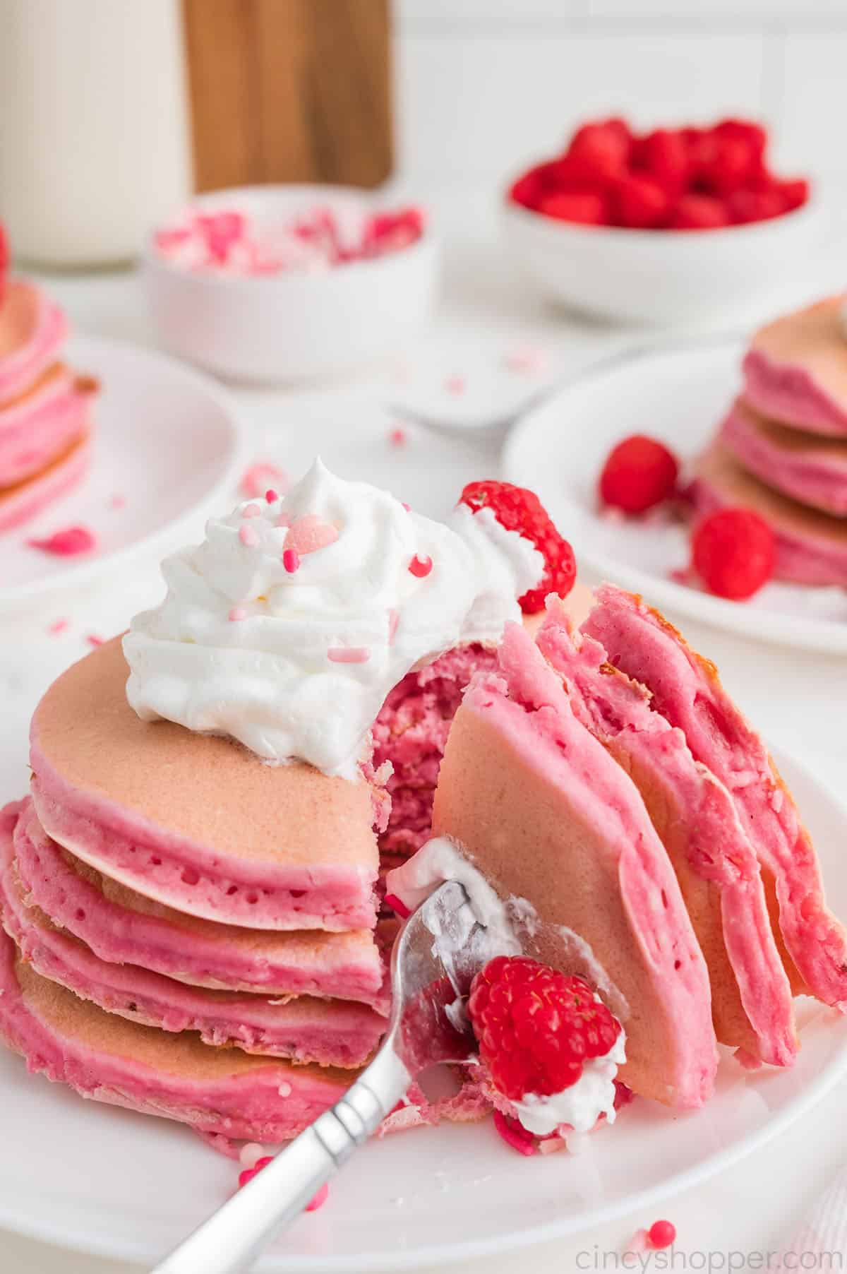 Pink Valentine Pancakes on a fork.