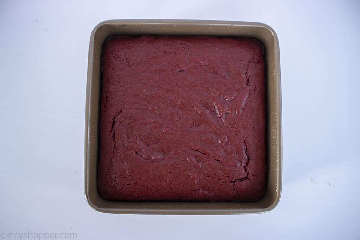 Baked red velvet brownies from cake mix in a baking pan.