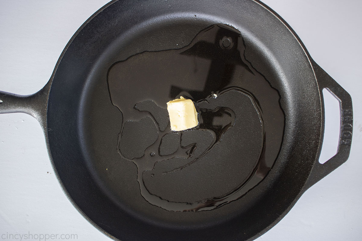 Oil and butter in a cast iron skillet.