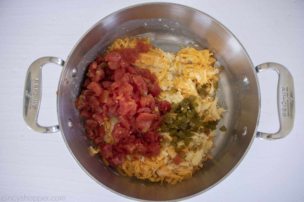 Rotel tomatoes and diced jalapenos added to cheese mixture.