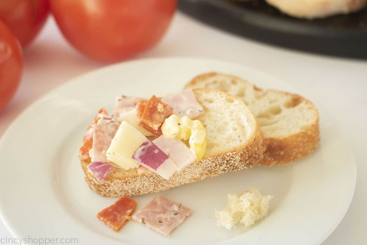 Hoagie dip on sliced crusty bread.