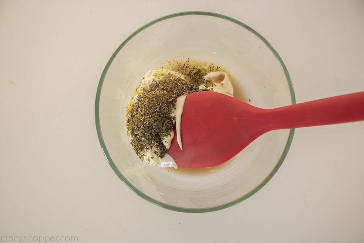 Hoagie dressing ingredients in a bowl.