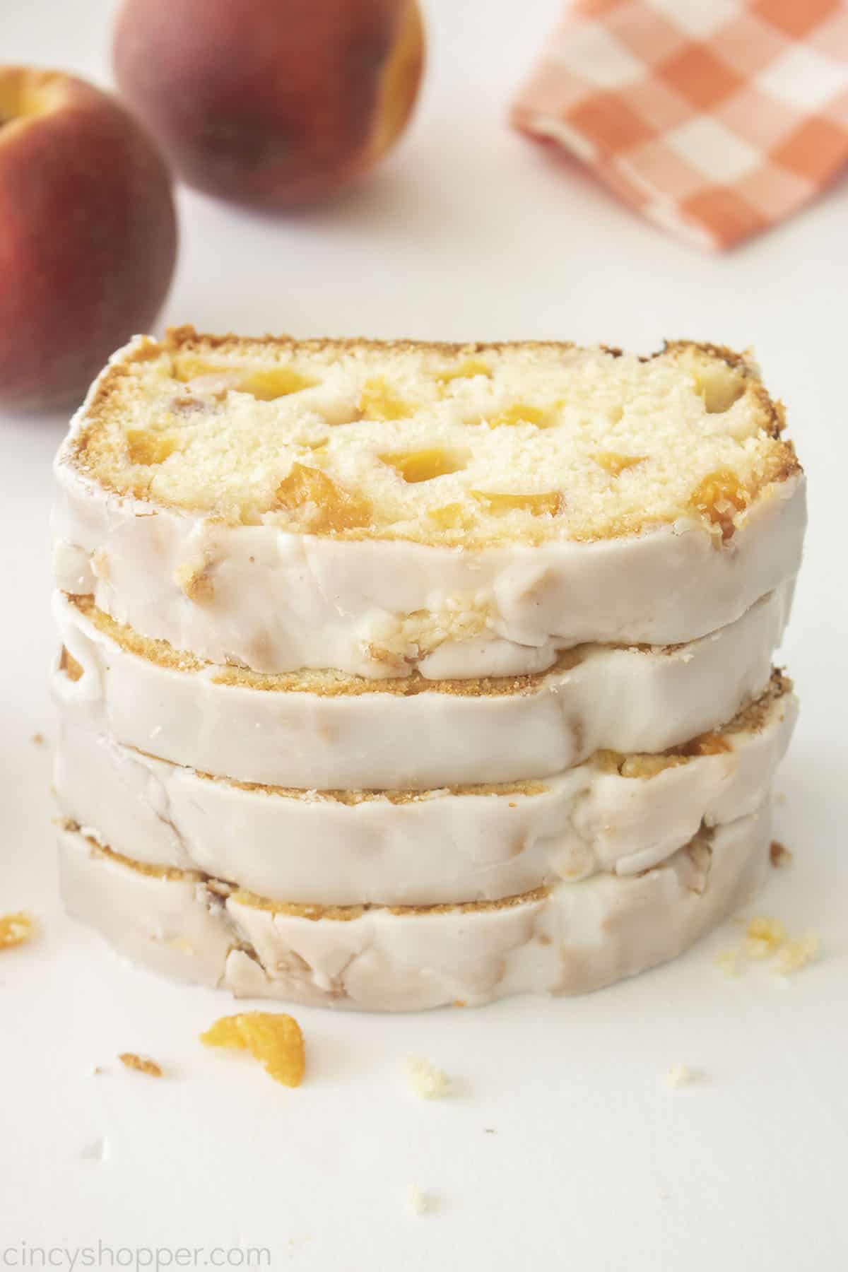 Stack of Peach bread Slices with glaze.