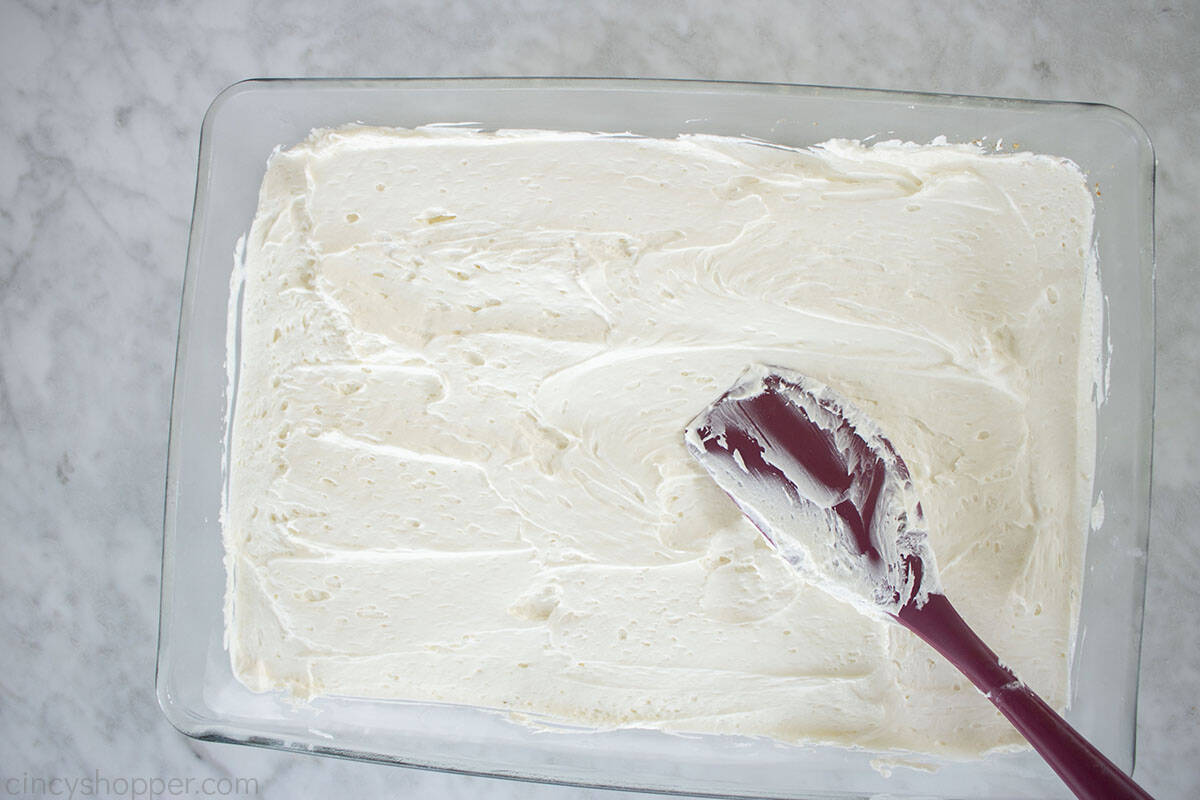 Cream Cheese mixture added to the top of baked pretzel crust.