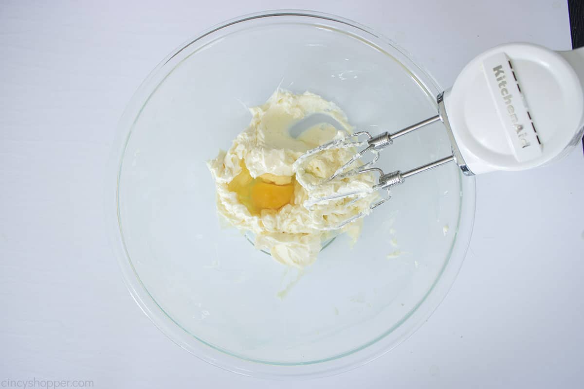 Egg added to cream cheese mixture.