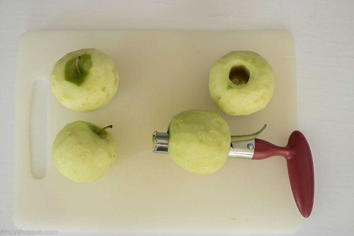 Green Apples with an apple corer.