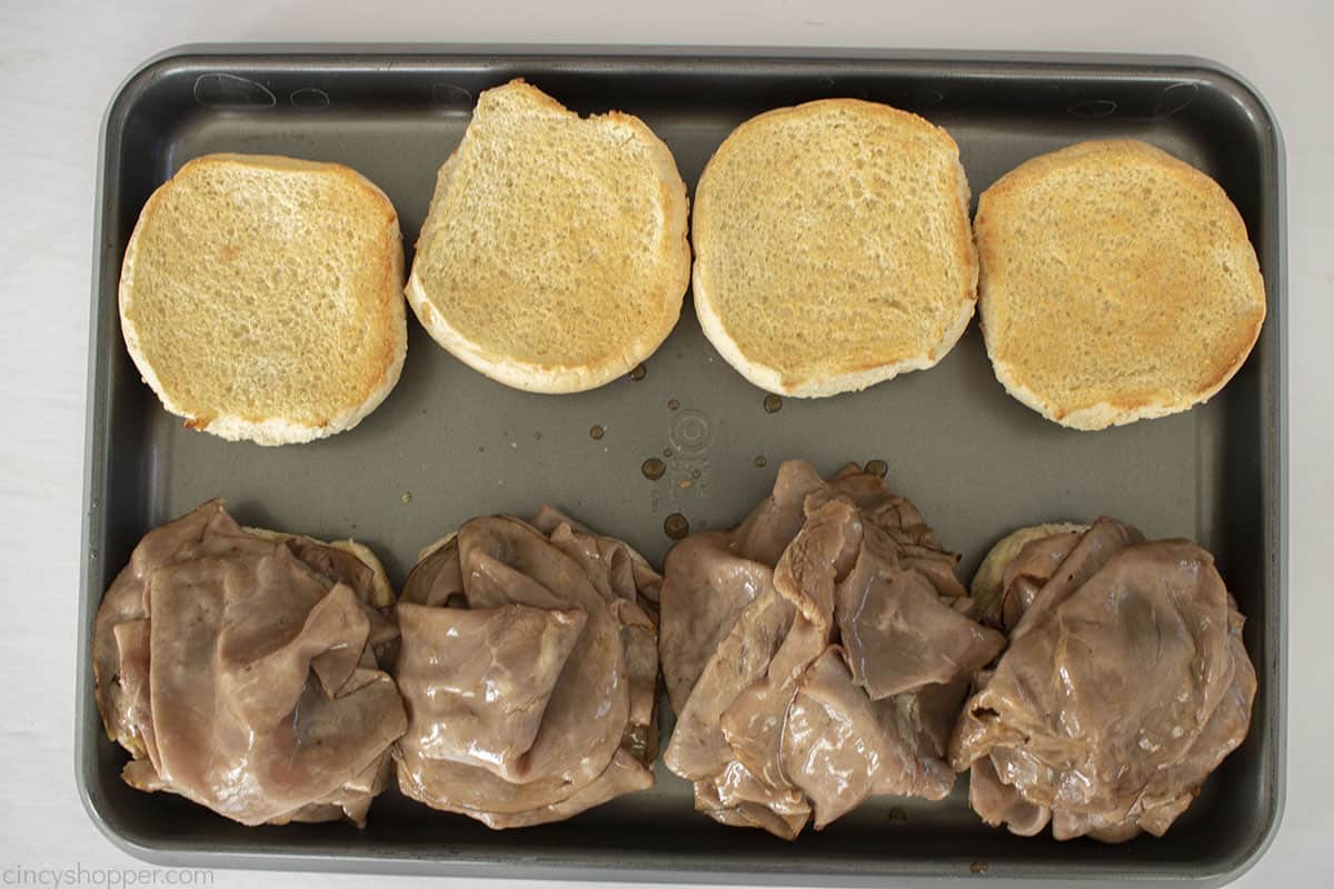 CopyCat Arby's Roast Beef on the top of toasted Sesame seed buns.