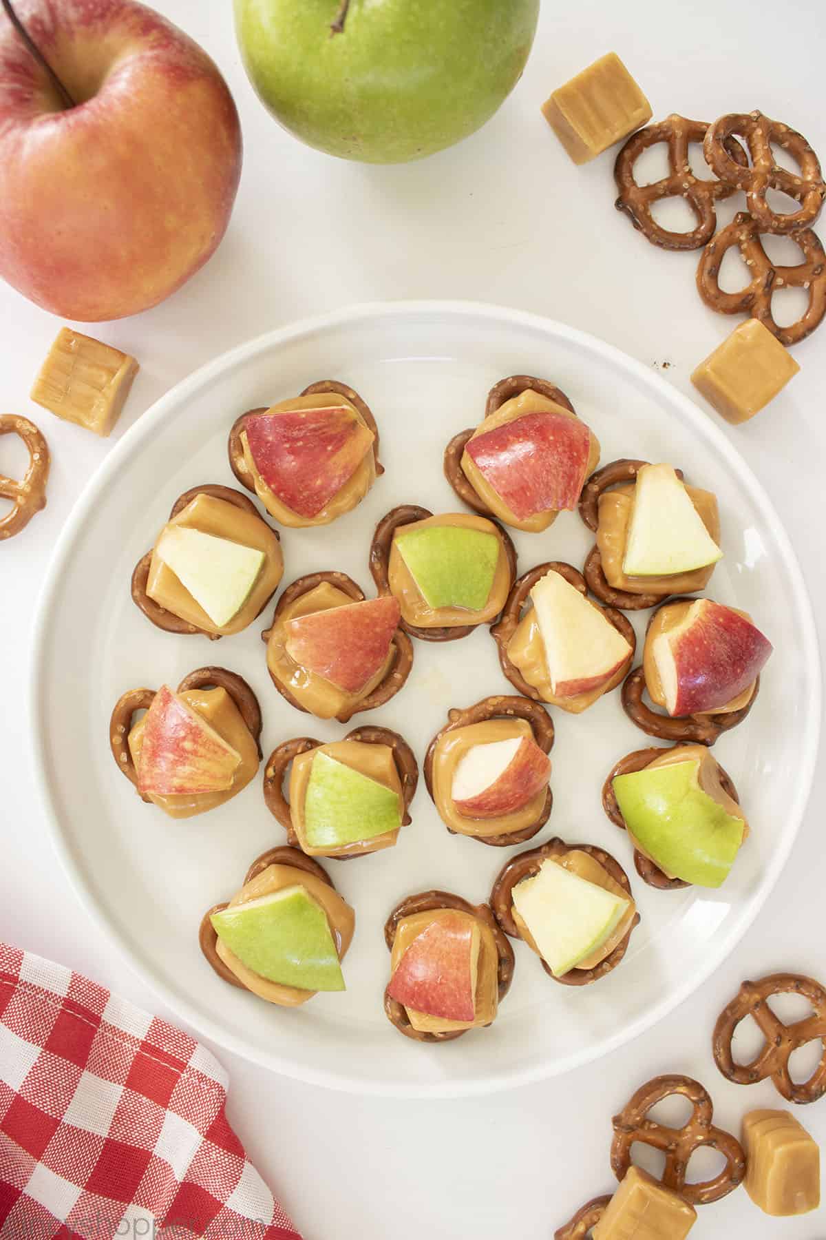 Caramel Apple Bites on a white plate.