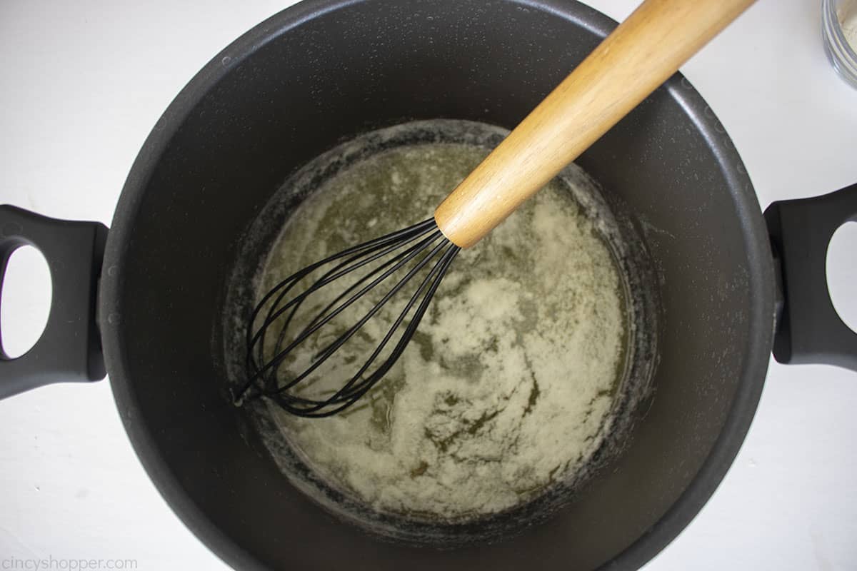 Melted butter in a large pot.