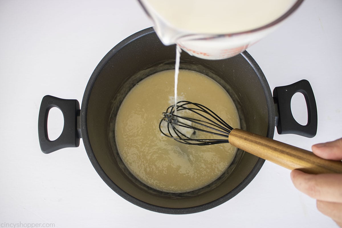 Milk added to flour roux.