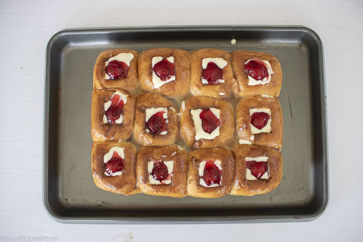 Fruit added to the top of each sweet roll.