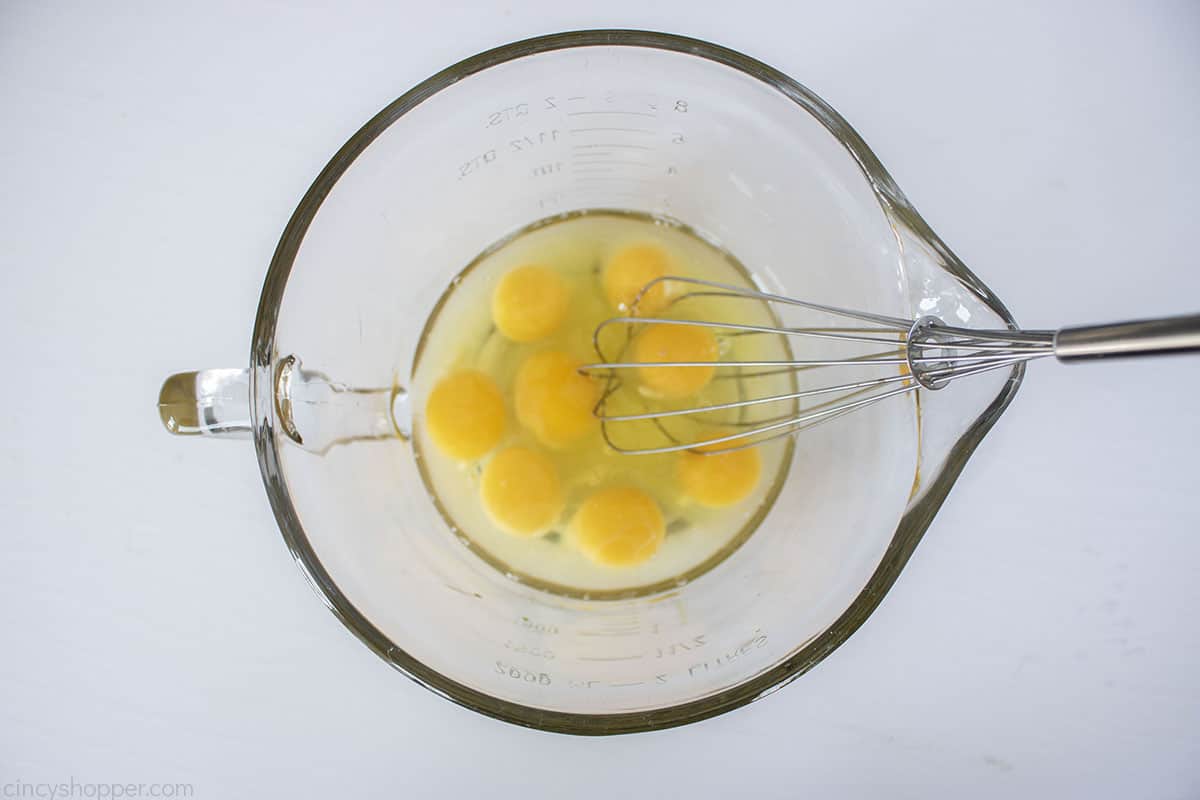 Eggs in a large measuring bowl.