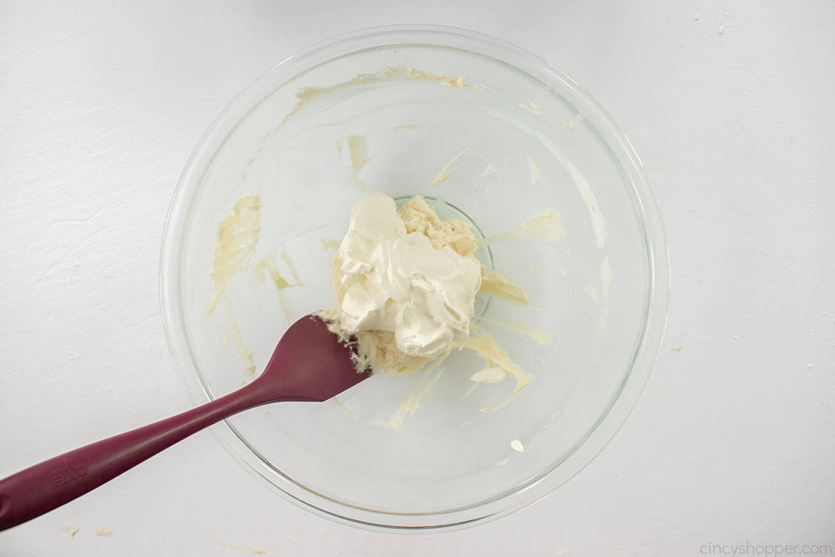 Whipped cream added to cream cheese filling mixture.