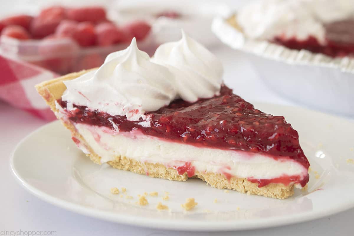 Slice of fresh raspberry pie.