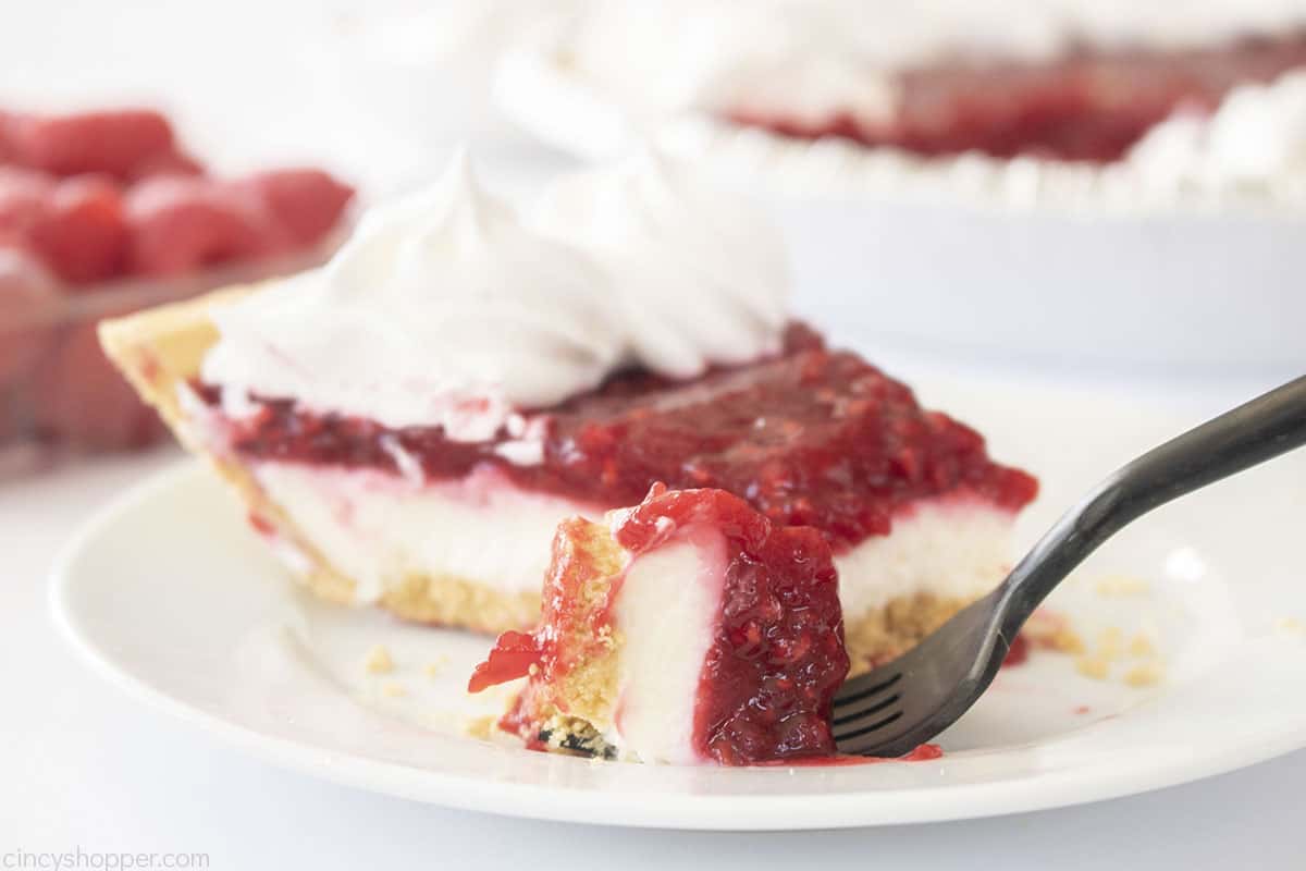 Fork with a piece of Raspberry Cream pie.