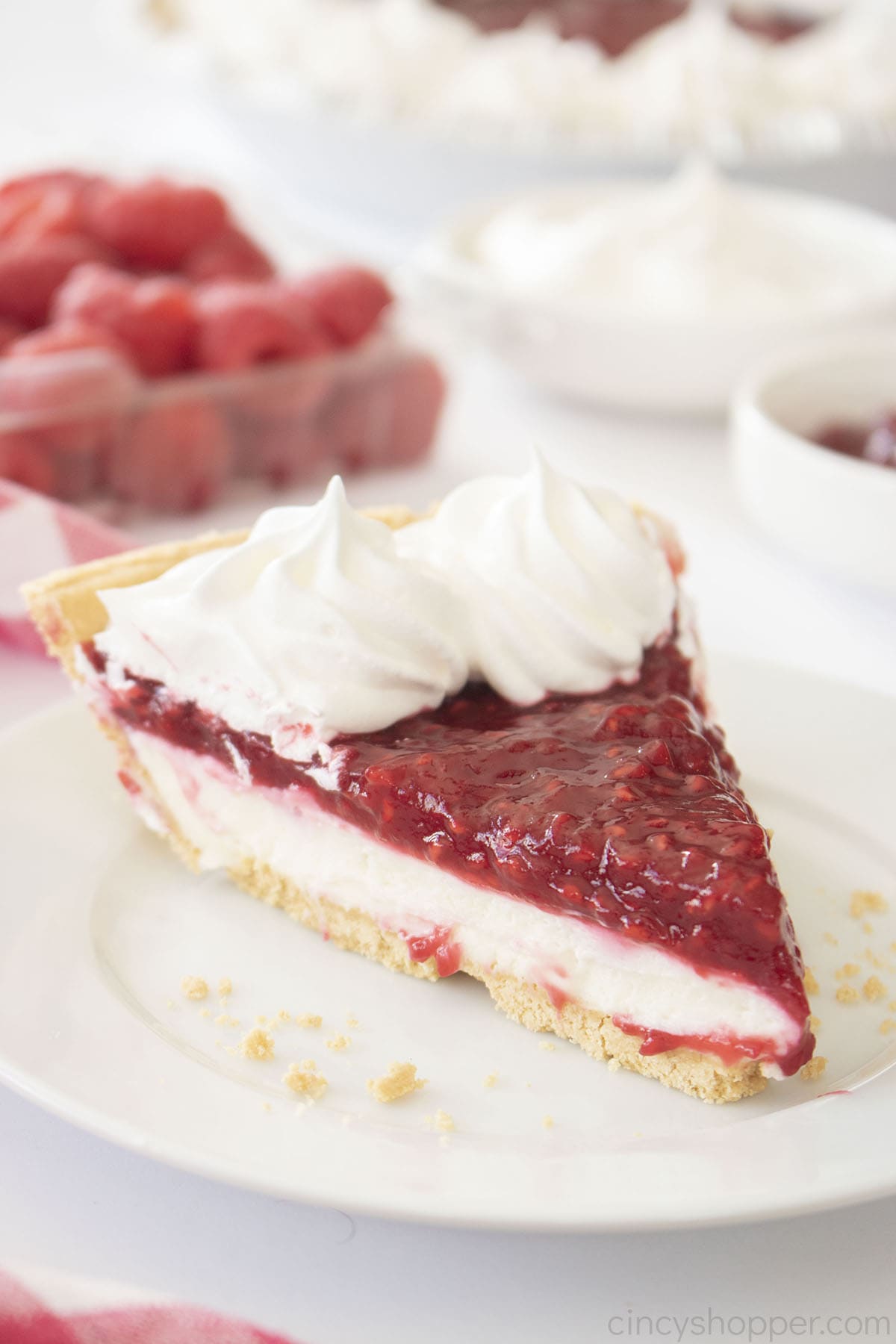 Slice of Raspberry Pie with Cream Cheese on a plate.