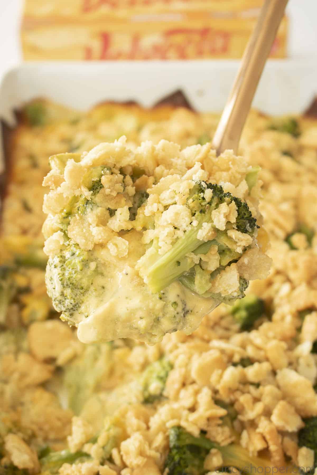 Velveeta Broccoli and Cheese Casserole on a spoon.