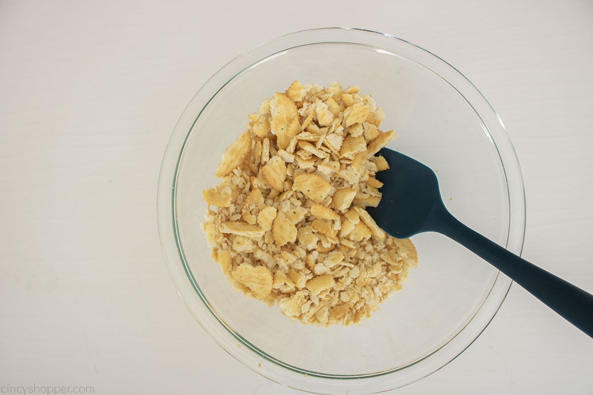 Crushed Ritz crackers in a bowl.