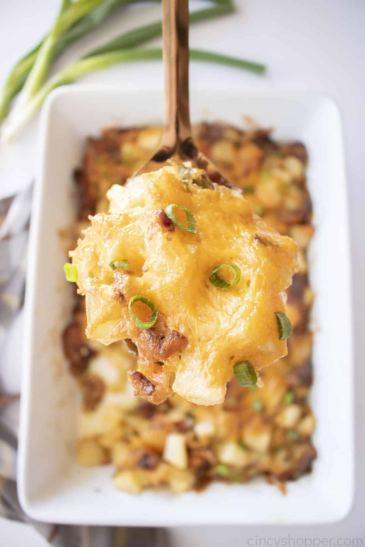 Mississippi Mud Potato casserole on a serving spoon.