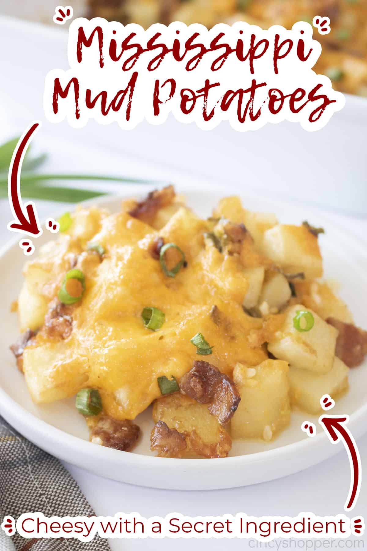 Text on image Mississippi Mud Potatoes Cheesy with a secret ingredient.