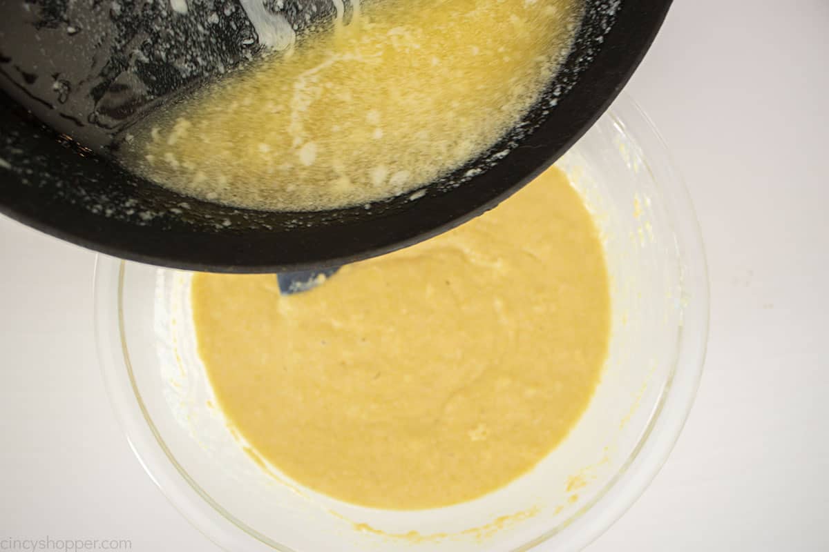 Melted butter added to cornbread batter.