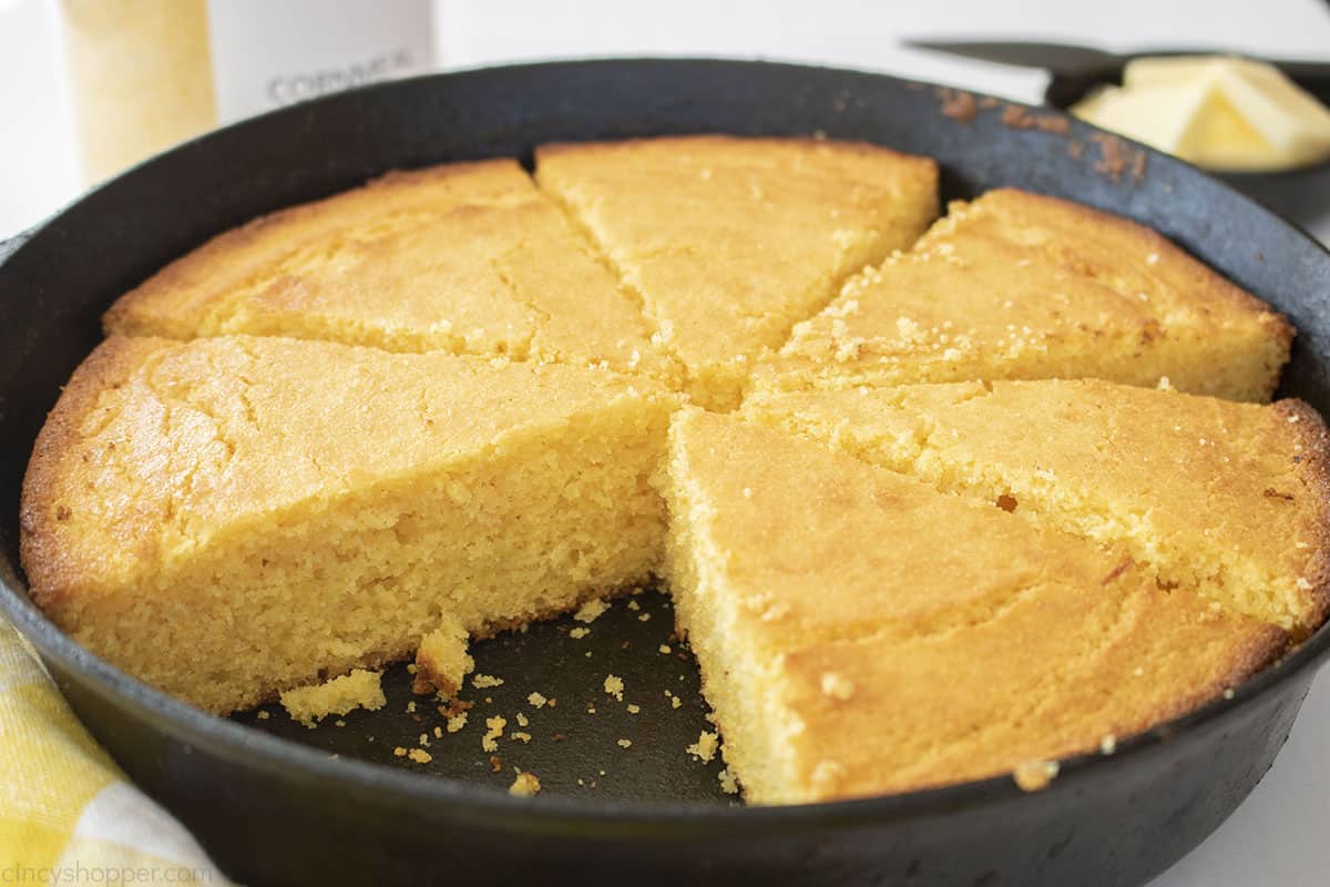 Cast iron cornbread slices inside of the pan.