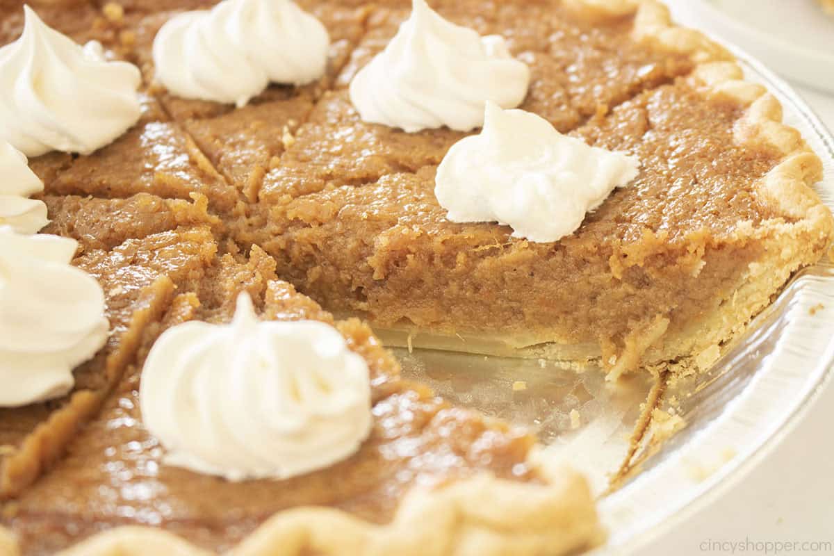 Slice missing from sideways view of sweet potato pie.