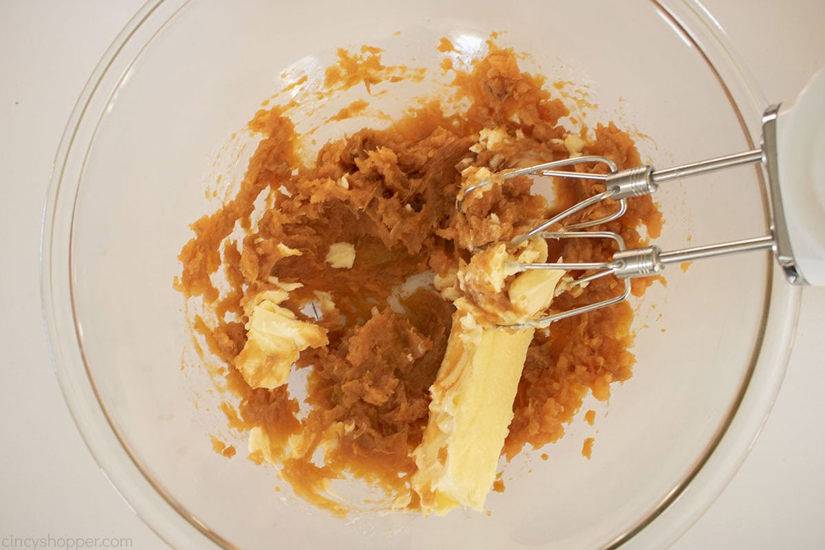 Butter added to mashed sweet potatoes.