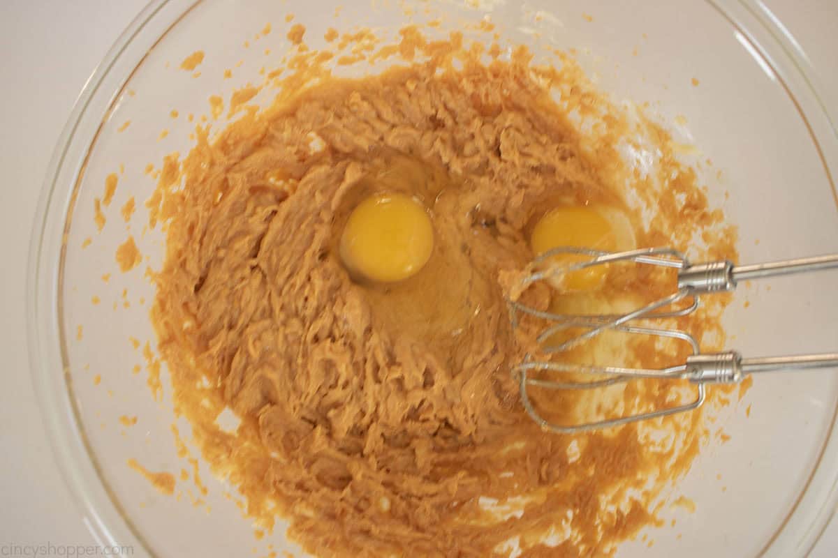 Two eggs added to sweet potato mixture.