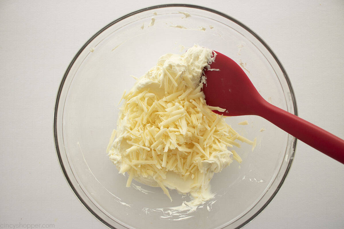 Sharp cheddar shredded cheese added to cream cheese mixture.