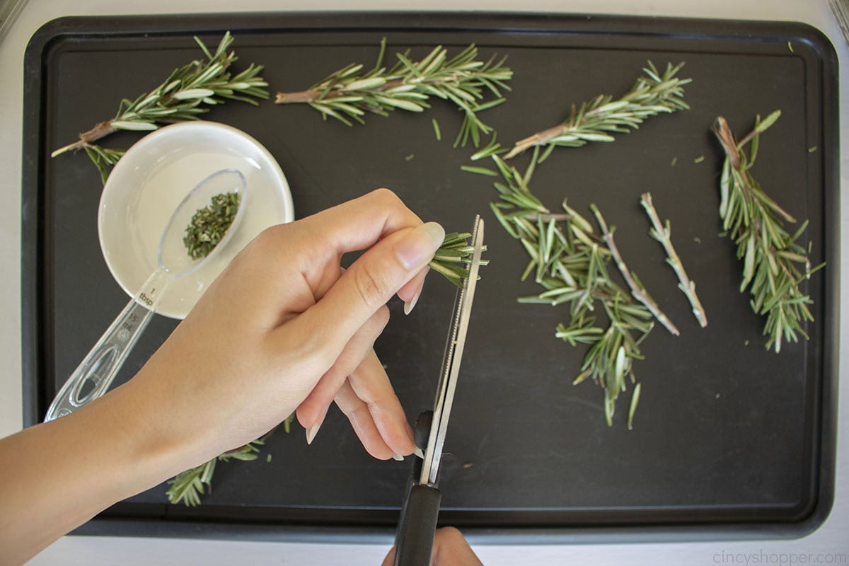 Cutting fresh rosemary.