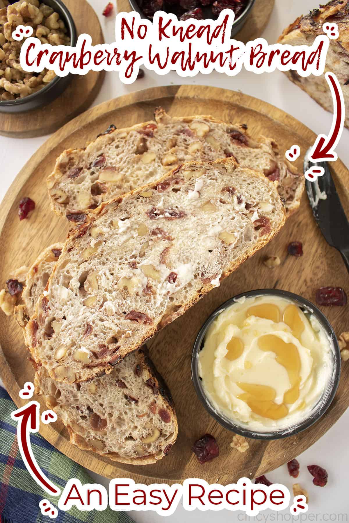 Slice of Cranberry Walnut Bread with butter.