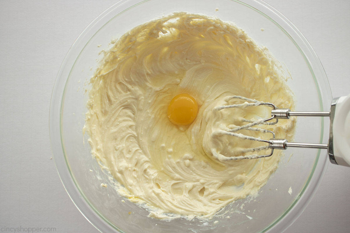 Egg added to cream cheese mixture.
