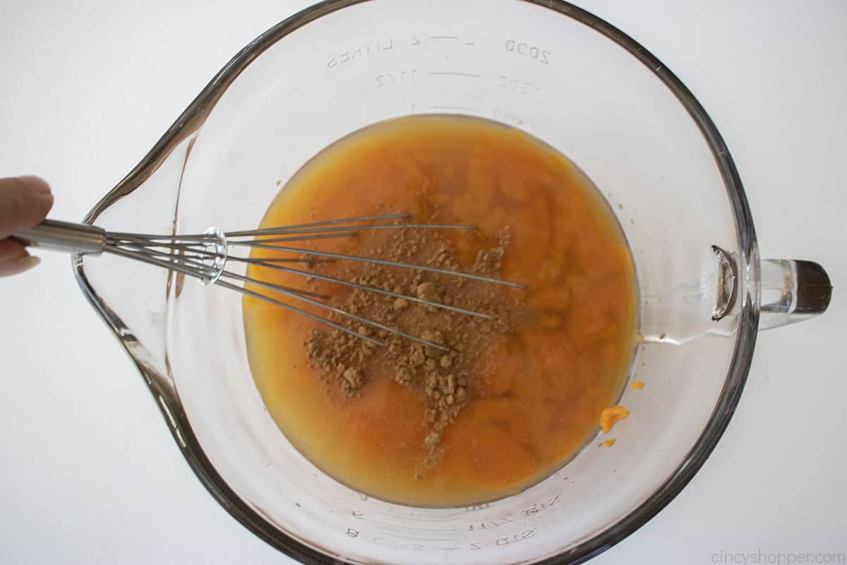 Whisking the Thanksgiving Punch.