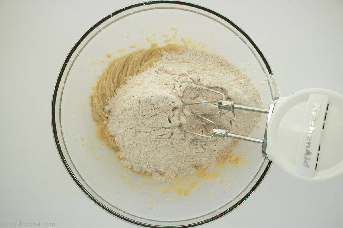 Flour added to cookie dough mixture.