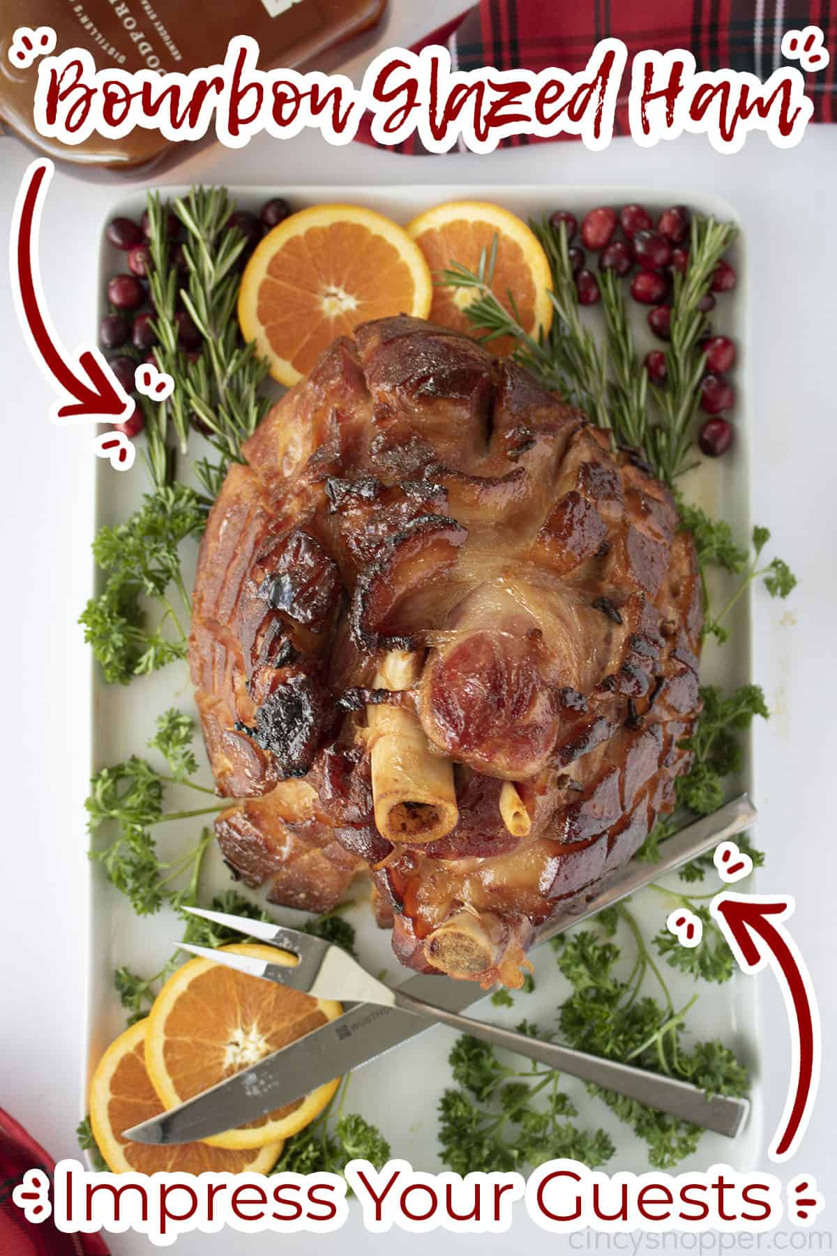 Overhead view of maple bourbon glazed ham with text on image "impress your guests"