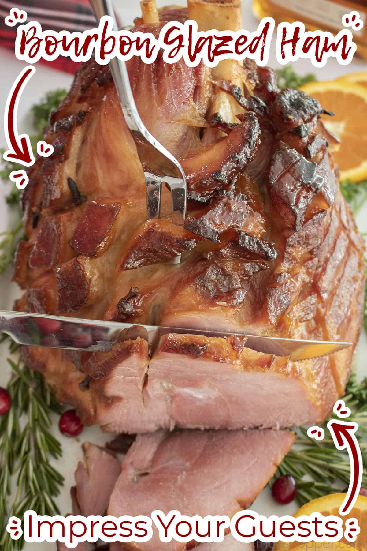 Slightly overhead view of Oven Baked ham with bourbon glaze with text on image "impress your guests"