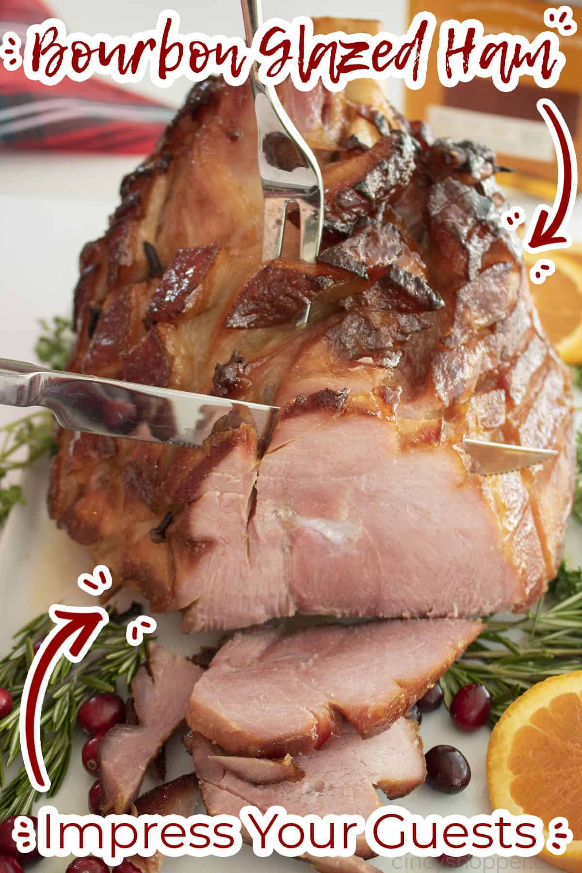 Eye level view of ham with Bourbon Glaze being sliced with text on image "impress your guests"