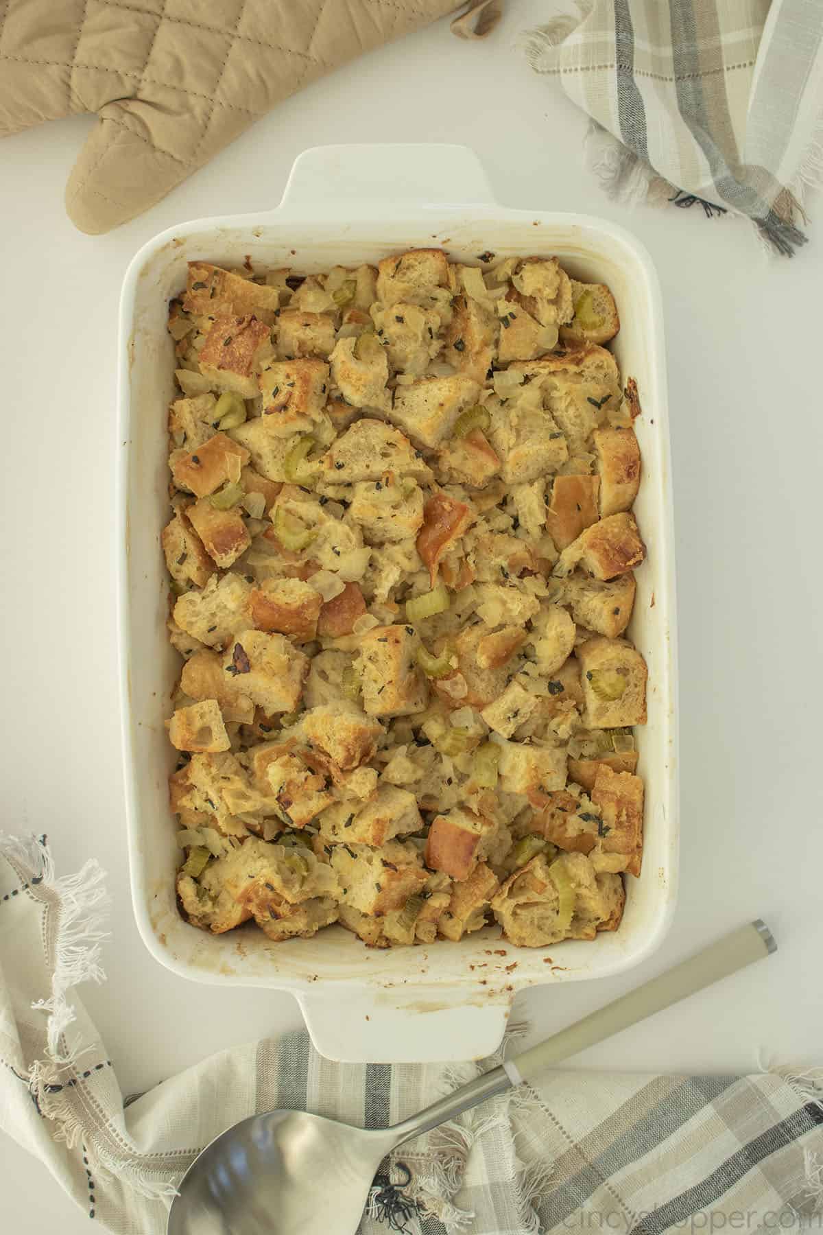 Butter & Herb Stuffing in a white casserole dish.